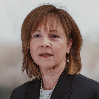 photo of Smiling woman in suit