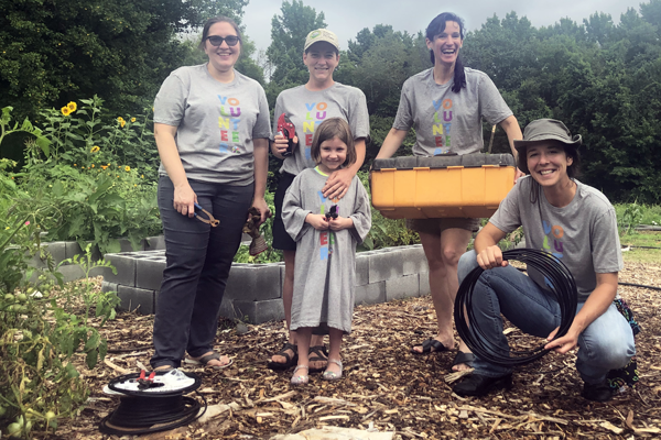 photo of Group of people cleaning up a park