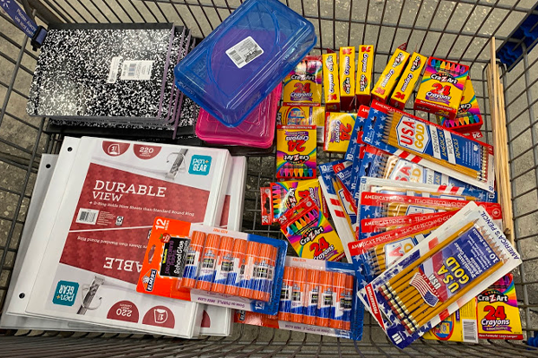 Photo of school supplies in cart Photo of school supplies in cart